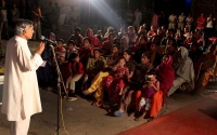 Addressing public meeting at Raipur Khurd